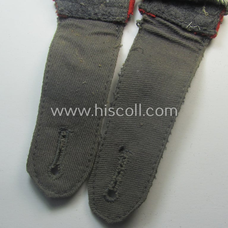 Truly used - and fully matching! - pair of WH (Luftwaffe) NCO-type shoulderstraps as piped in the bright-red branchcolour as was intended for a: 'Wachtmeister u. Offiziers-Anwärter der Flak-Art.-Trpn.'