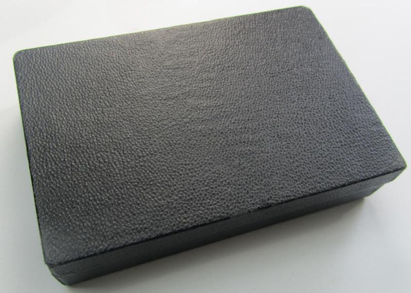 'Ehrenblattspange des Heeres' (or: army honour-roll clasp) being a 'Buntmetall'- (ie. 'Tombak'-) based example by the maker (ie. 'Hersteller') 'Otto Klein & Co.' that comes in its rarely seen black-toned etui