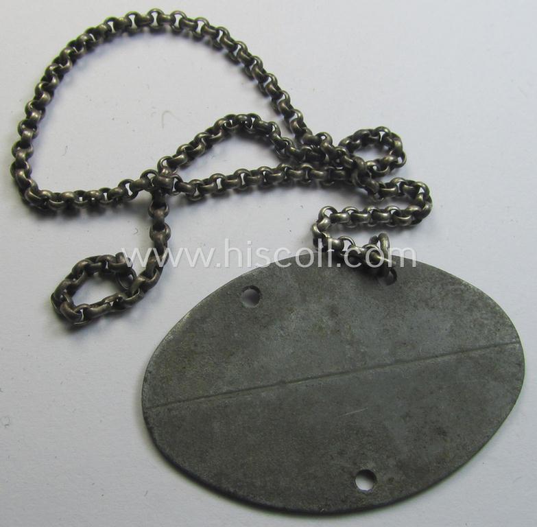 Mid-war- (albeit 'standard-issue'-) pattern, WH (Kriegsmarine) typical zinc- (ie. 'Feinzink'-) based- and greyish-toned ID-disc (ie. 'Erkennungsmarke') bearing the engraved numeral (ie. date) that reads: 'Horst Rümeke - Seeoffz. Okt. 43'