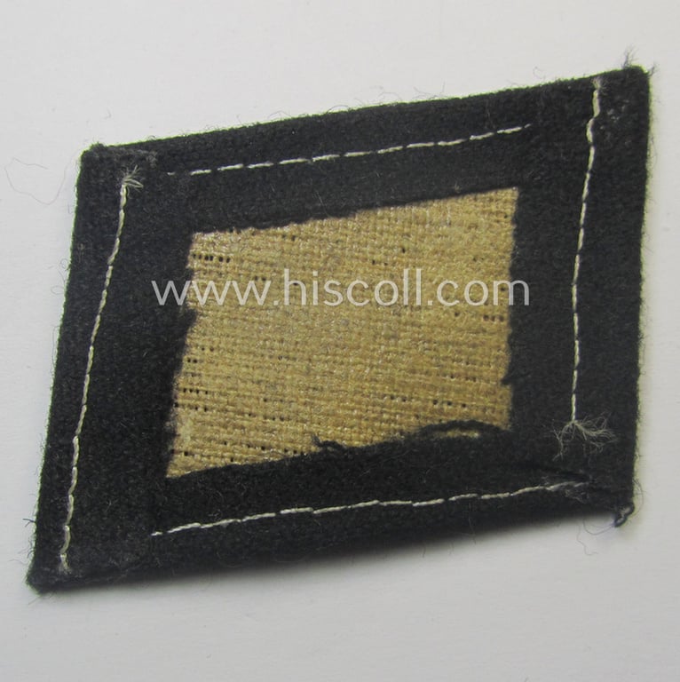 Minimally used, Waffen-SS - so-called: 'RzM-styled' - EM- (ie. NCO-) type collar-tab as was intended for usage by soldiers ie. NCOs of the: '15. o. 19. Waffen-Grenadier-Division der SS' (ie. 'lettische nr. 1 o. 2')