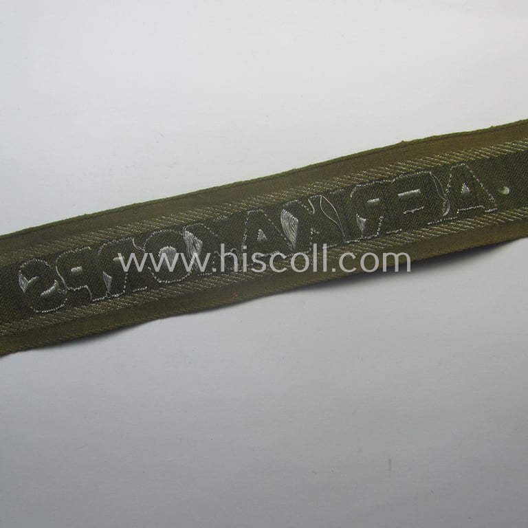 'BeVo'-like cuff-title (ie. 'Ärmelstreifen') entitled: 'Afrikakorps' being a presumably issued but simply never worn example that comes in an overall very nice- (ie. non-shortened- and never tunic-attached-), condition