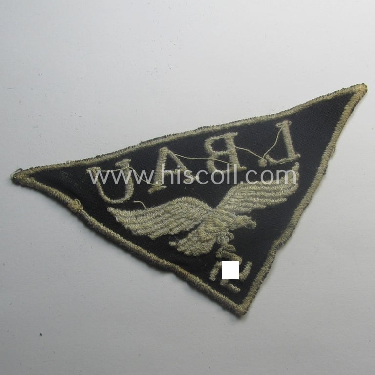 WH (Luftwaffe)-related- (EM- ie. NCO-pattern-) machine-embroidered breast-badge ie. eagle-device showing the text: 'L. Bau' as was (I deem) specifically intended for staff working within the WH 'Generalluftzeugmeister'- (ie. 'GL'-) organisation