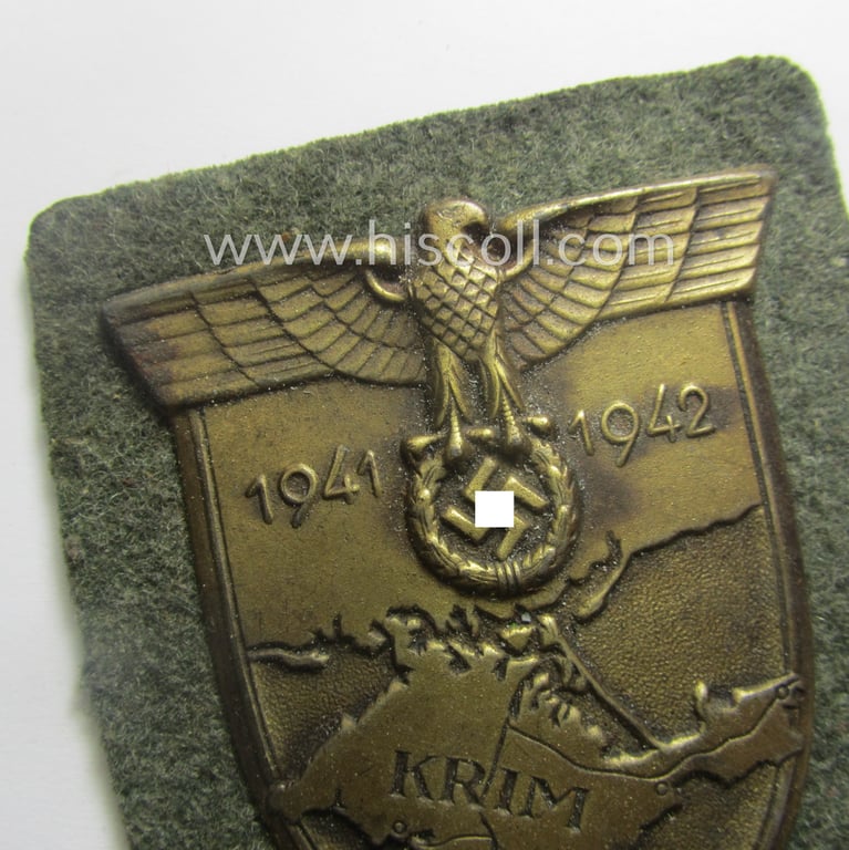 Simply never used, WH (Heeres ie. Waffen-SS) 'Krim'-campaign-shield (as was produced by a by me unidentified maker)