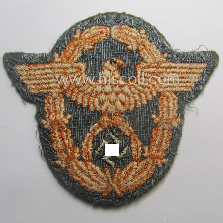 Truly worn, Field-police- (ie. WH (Heeres) related-) arm-eagle (ie. 'Ärmeladler') as was intended for usage by the staff of the notorious 'Feldgendarmerie-Trpn.'