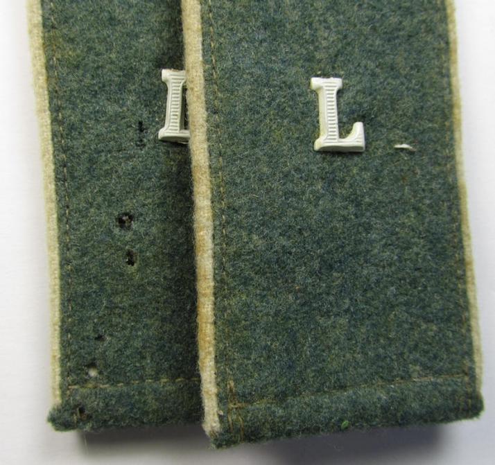Fully matching pair of WH (Heeres) mid- ie. (later-) war-period (ie. 'M43'-pattern-) EM-type and 'cyphered' shoulderstraps as piped in the white-coloured branchcolour as was intended for a: 'Soldat eines Landesschützen-Regiment'