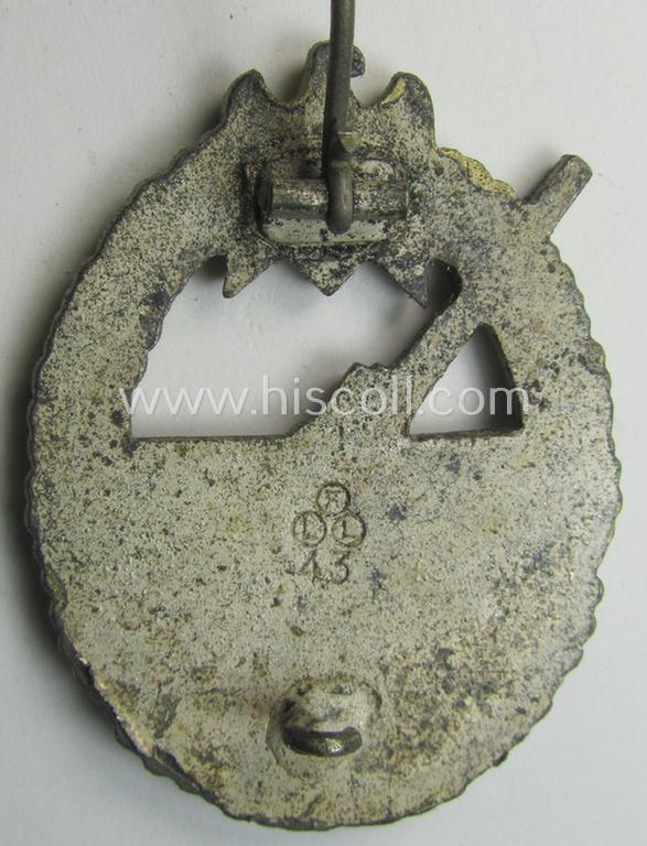 WH (KM) 'Marine-Artillerie-Abzeichen' being a maker- (ie. 'F.L.L. - 43'-) marked- and/or zinc- (ie. 'Feinzink'-) based example by the: 'Friedrich Linden'-company