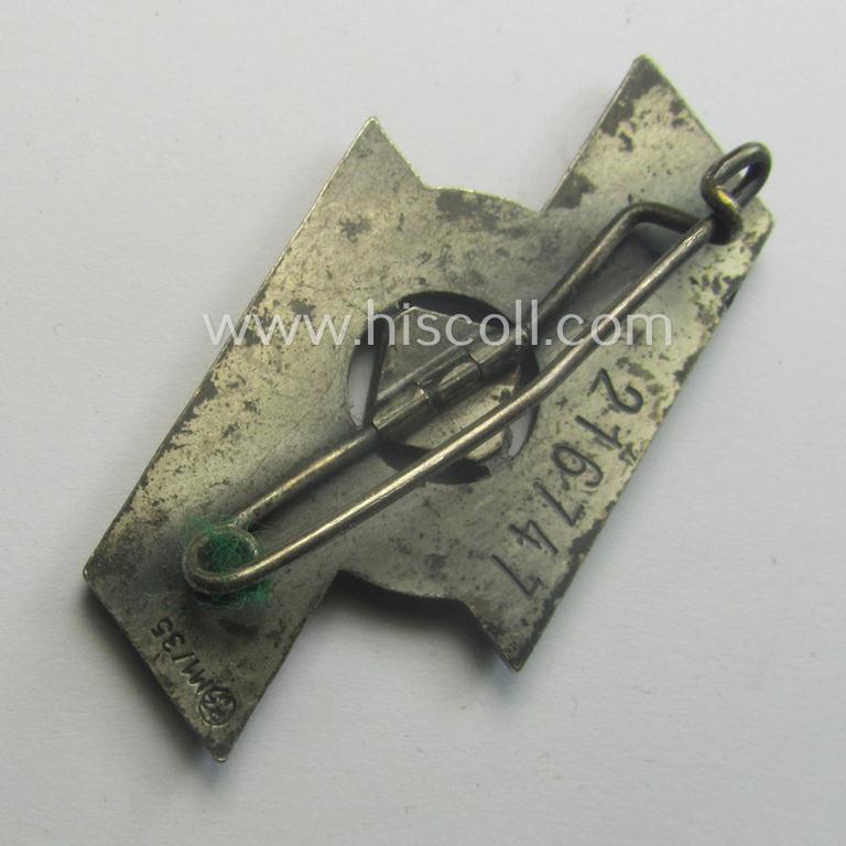 DJ- (ie. 'Deutsches Jungvolk'-) so-called: 'Leistungsabzeichen in Silber' (or: silver-class youth sports'-badge) being a clearly maker- (ie. 'RzM - M1/35'-) marked specimen that shows an engraved (unique) bearers'-numeral ('216747')