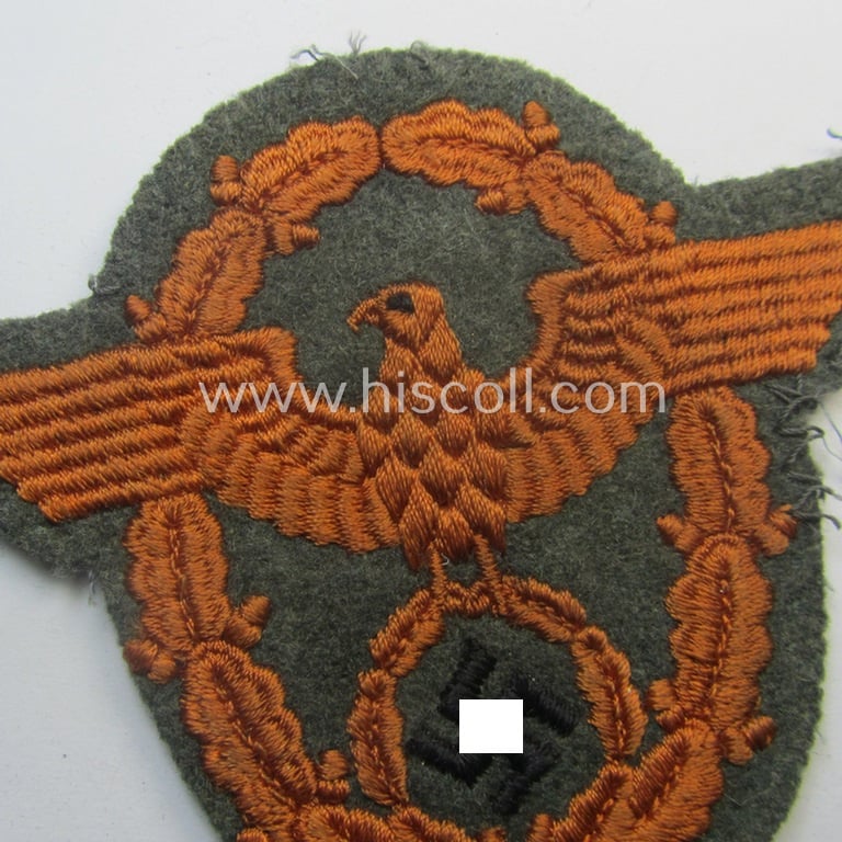 Truly worn, Field-police- (ie. WH (Heeres) related-) arm-eagle (ie. 'Ärmeladler') as was intended for usage by the staff of the notorious 'Feldgendarmerie-Trpn.'