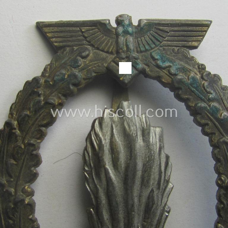 WH (Kriegsmarine) 'Kriegsabzeichen für Minensuch-, U-Boot-Jagd und Sicherungs-Verbände' being a detailed and clearly maker- (ie. 'R.K.') marked, 'Feinzink'-based example as was produced by the 'Rudolf Karneth'-company