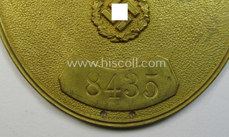 Attractive - bright-golden-toned- and/or metal-based - so-called: 'Reichsfinanzverwaltung-Zollgrenzschutz'-related armshield being a hardly used example that is bearing the stamped (unique) serial-number: '8435'