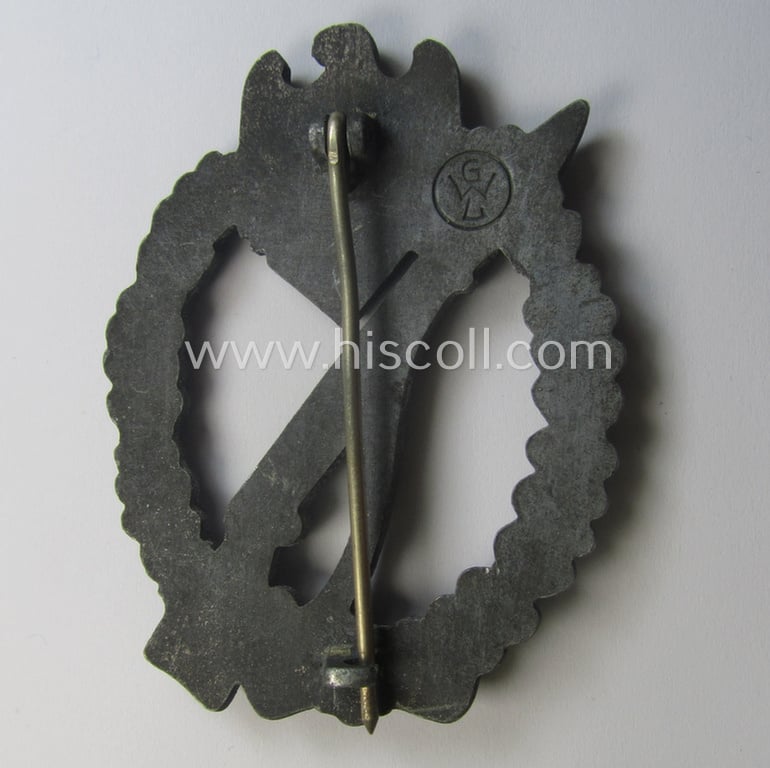 'Infanterie-Sturmabzeichen in Silber' (or: silver-class IAB) being a clearly maker- (ie. 'GWL'-) marked, zinc- (ie. 'Feinzink'-) version ie. molded-'variant' by the: 'Gebrüder Wegerhoff'-company
