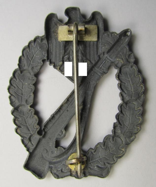 Superb, 'hollow-back' 'Infanterie Sturmabzeichen in Silber' (or: silver infantry assault badge ie. IAB) being a non-maker-marked example as executed in zinc-based metal (ie. 'Feinzink') as was produced by the: 'Wilh. Deumer'-company