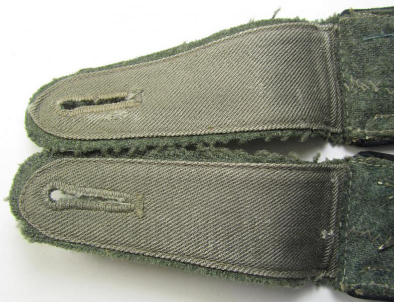 Fully matching, WH (Heeres), I deem mid-war-period- (ie. 'M43'-pattern-) NCO-type shoulderstraps as piped in the black-coloured branchcolour as was intended for - and/or used by! - an: 'Oberfeldwebel der Pionier-Truppen'