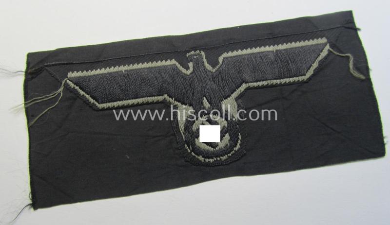 Later- (ie. mid-war-) period, WH (Heeres) 'Panzer'-type breast-eagle (ie. 'Brustadler für Panzertruppen') being a 'virtually mint- ie. unissued' example as executed in bluish-grey-coloured linnen on a black-coloured background