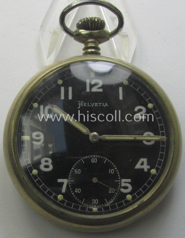 Non-functional 'Deutsche Wehrmacht'- (ie. typical WWII-period!) pocket-watch (ie. 'Dienstuhr') of the make: 'Helvetia' having a black-coloured dial-plate and/or engraved back-plate that reads: 'D 19942 H'