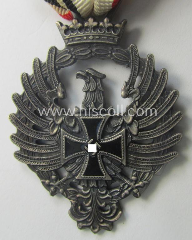 Attractive example of a Spanish-issued, campaign-medal of the Spanish Blue Division in Russia called: 'Medalla Conmemorativa Division Azul - Medalla de Tropa 1941' that comes mounted on its period ribbon as issued and/or worn