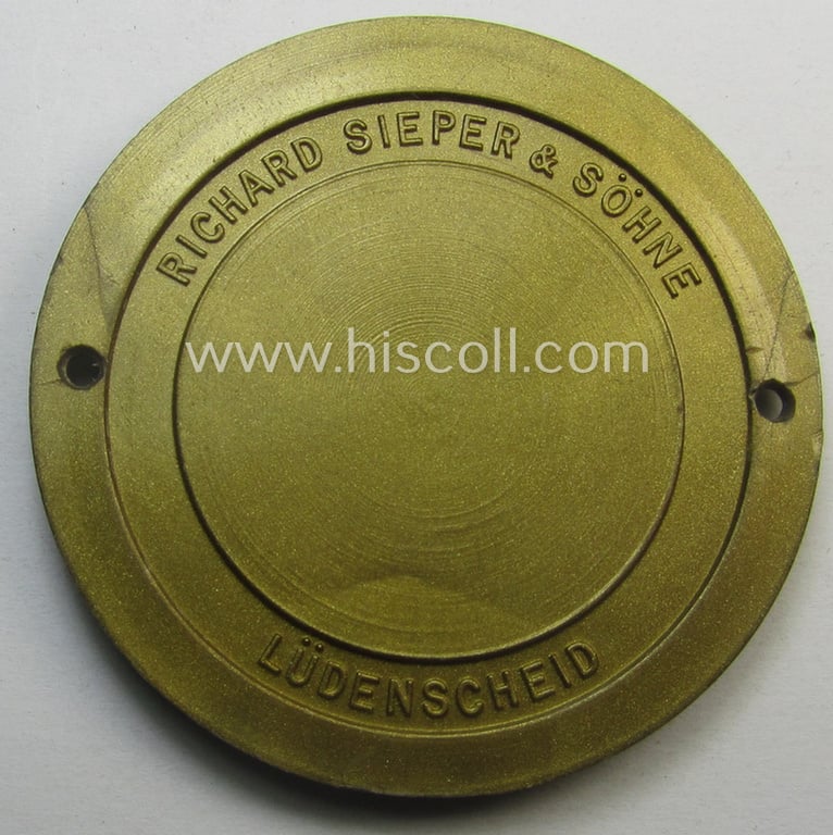 Bright golden-coloured- and 'molded'-resin-based, N.S.K.K.- (ie. 'National Socialistisches Kraftfahr Korps-') related vehicle-plaque (ie. 'Plakette') bearing the text: 'Motorgruppe Hochland - München - Fahrt durch Bayerns Berge und Tirol - 1938'