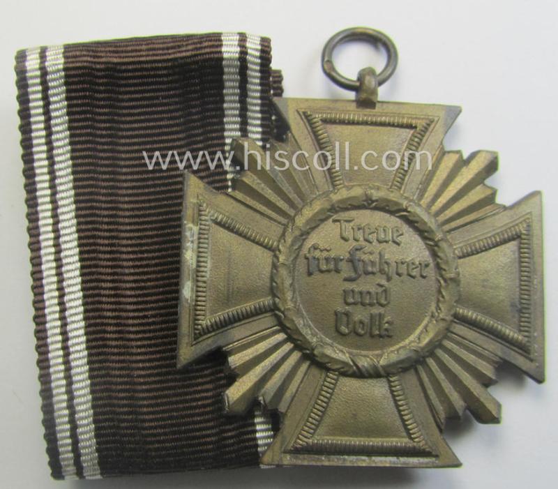 'N.S.D.A.P. Dienstauszeichnung in Bronze' (ie. '3. Stufe für 10 Jahre t. Dienste') being a clearly maker- (ie. '10'-) marked- (and 'light-weight'!) example as was produced by the maker (ie. 'Hersteller') named: 'Förster & Barth'