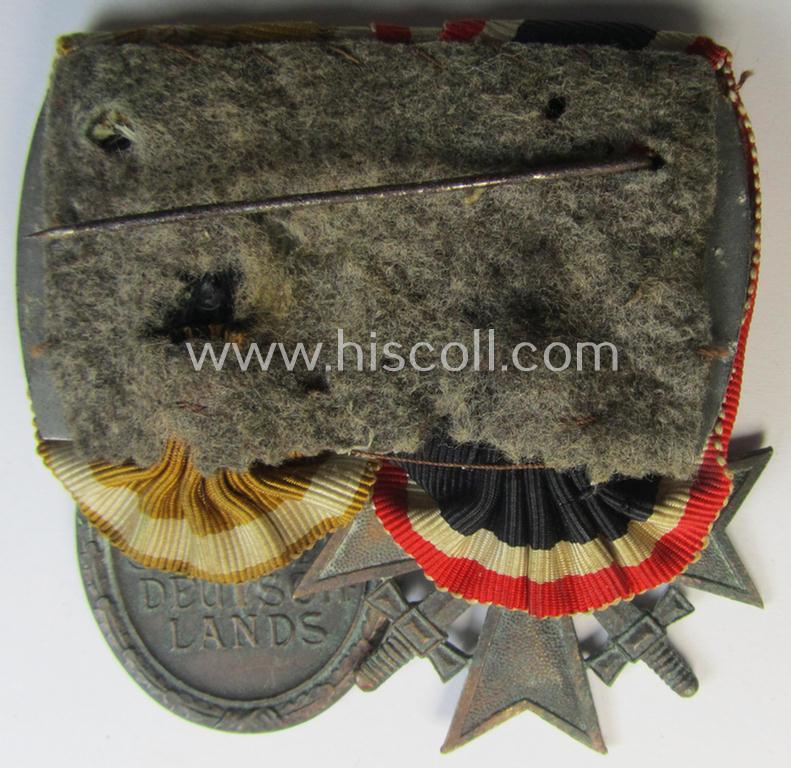 Neat - and clearly used! - two-pieced medal-bar (ie. 'Ordenspange') showing resp. a: 'Kriegsverdienstkreuz 2. Klasse mit Schwn.' and a: 'Westwall'-medal that come period-mounted as a: 'Doppelspange'