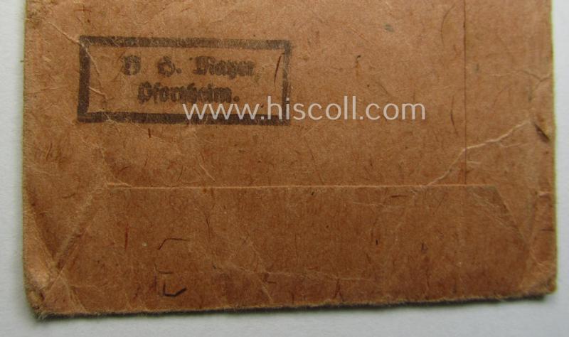 Empty 'Zellstoff'-based pouch as was intended for a medal: 'Winterschlacht im Osten 1941/42' as was produced by the company: 'B.H. Mayer's Kunstprägeanstalt' (ie. 'Hersteller 26')