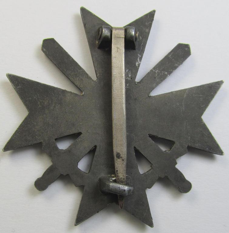 'Kriegsverdienstkreuz 1. Klasse mit Schwerter' (being a maker- ie. '62'- (ie. by: 'Kerbach & Oesterhelt'-) marked specimen that is executed in silverish-grey-coloured and/or (typical) zinc-based metal (ie. 'Feinzink')