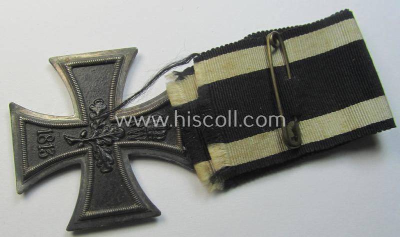 Attractive, WWI-period: 'Eisernes Kreuz II. Klasse' (or: iron cross second class) being a neatly maker- (ie. 'KO'-) marked example that comes mounted onto its confectioned (and longer-sized!) ribbon (ie. 'Bandabschnitt')