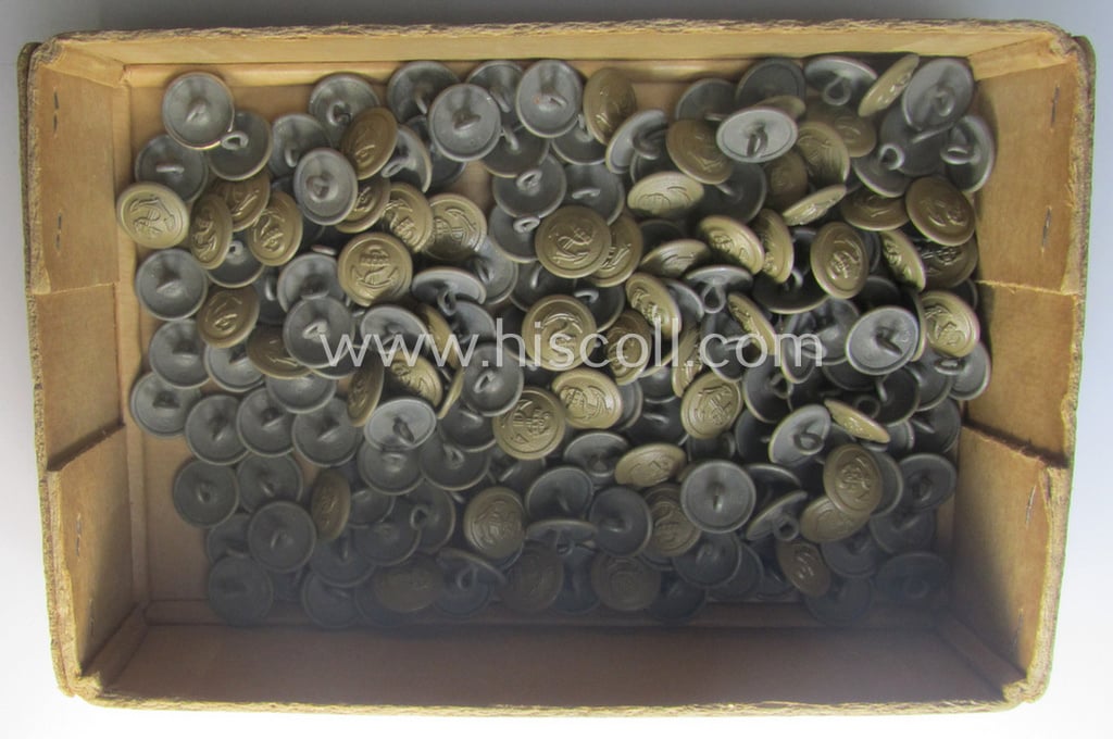 Interesting, 12-pieced set of field-grey- (ie. tan!) coloured, WH (Kriegsmarine o. Küsten-Artillerie) tunic-buttons (ie. 'Uniformknöpfe für Küsten-Marine Einheiten') being non maker-marked examples that come in a 'mint- ie. unissued', condition