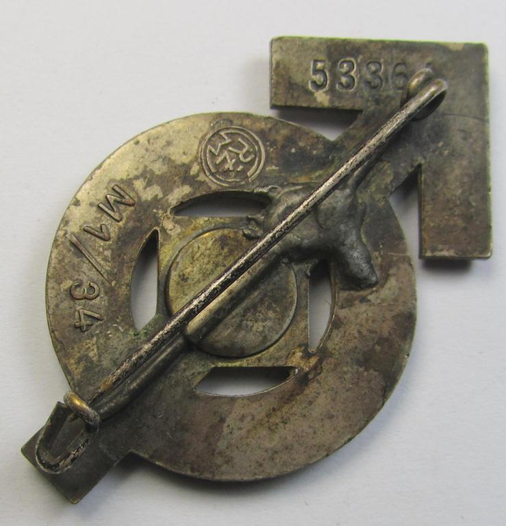 Attractive, HJ- (ie. 'Hitlerjugend'-) sports-badge (or: 'HJ-Leistungsrune') of the silver-class being a clearly maker- (ie. 'RzM - M1/34'-) marked- and/or: 'Cupal'-based specimen that shows an engraved (unique) bearers'-numeral ('53364')