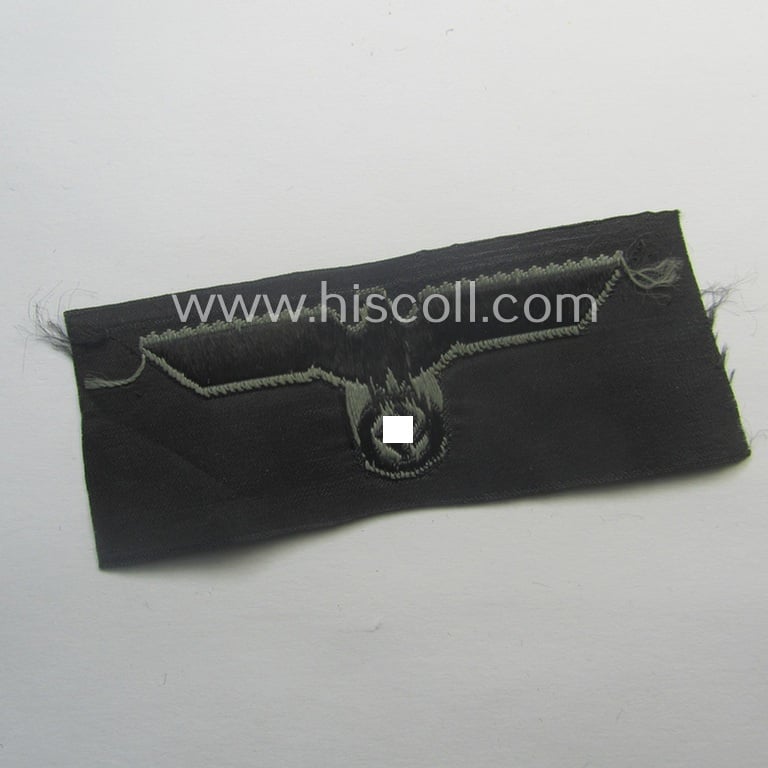 WH (Heeres) later- (ie. mid-war-) period- and/or bluish-grey-coloured 'Panzer'-type side-cap-eagle a executed in the neat 'BeVo'-weave pattern onto a typical black-coloured background