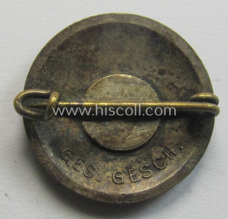 Superb - bright-red-coloured-, 'variant'-pattern and I deem early-period! - 'N.S.D.A.P.'-membership-pin- ie. party-badge (or: 'Parteiabzeichen') being a non-maker-marked specimen that bears a: 'Ges.Gesch.'-patent-pending-designation