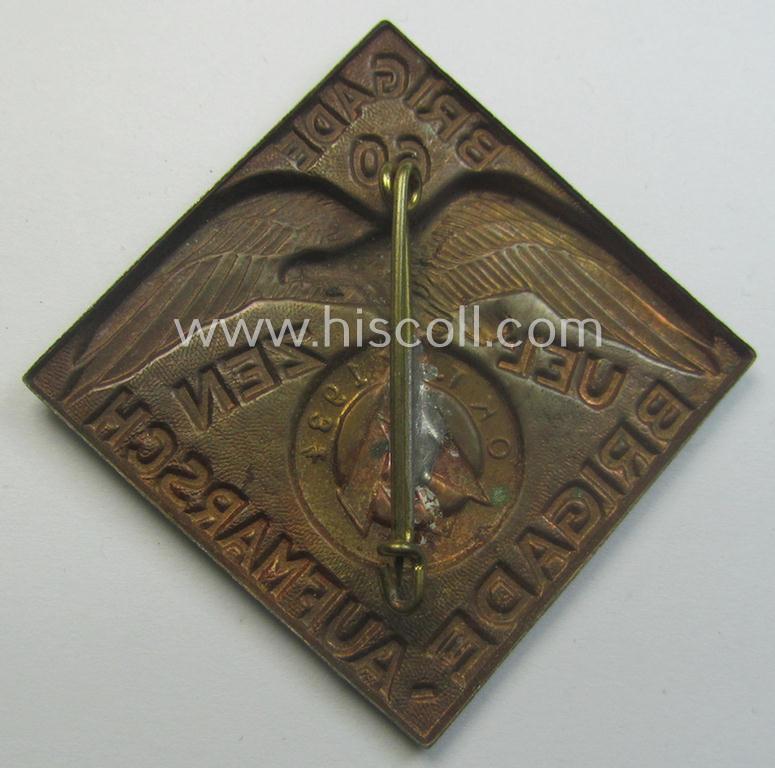 Unusually seen, commemorative SA- (ie. 'Sturmabteilungen'-) related 'tinnie' being a non-maker-marked example showing an eagle-device holding an SA-logo coupled with the text: 'Brigade-Aufmarsch - Brigade 60 - Uelzen - Okt. 1934'