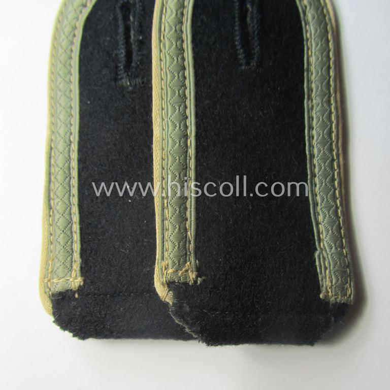 Stunning pair of Waffen-SS NCO-type shoulderstraps as piped in the white-coloured branchcolour as was intended for usage by an: 'SS-Unterscharführer' who served within the: 'Waffen-SS Infanterie-Trpn.'