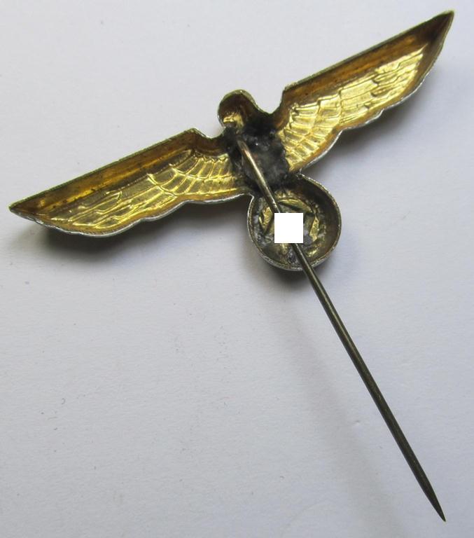 WH (Kriegsmarine) 'single-pattern'-eagle-pin being a non-marked example as was intended for attachment to the (darker-blue- ie. white-topped-) so-called: 'Tellermützen'