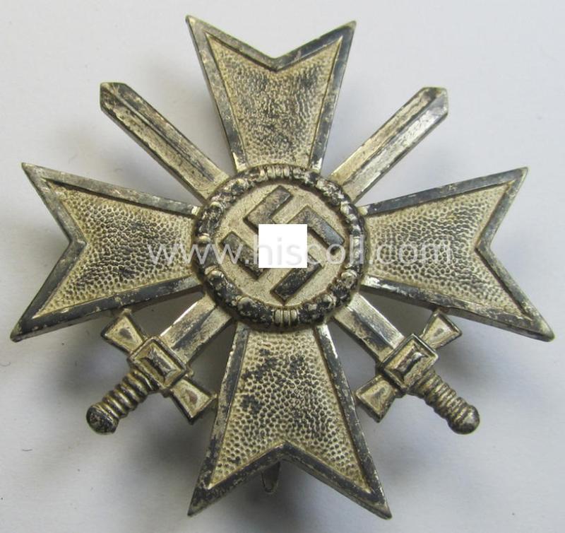 Attractive - and just moderately used! - example of a: 'Kriegsverdienstkreuz 1. Kl. mit Schwertern' being a maker- (ie. 'L/11'-) marked (and/or: 'Buntmetall'-based!) specimen that came as issued and/or stored for decades