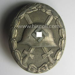 Silver-class woundbadge (or: 'Verwundeten Abzeichen in Silber') being...