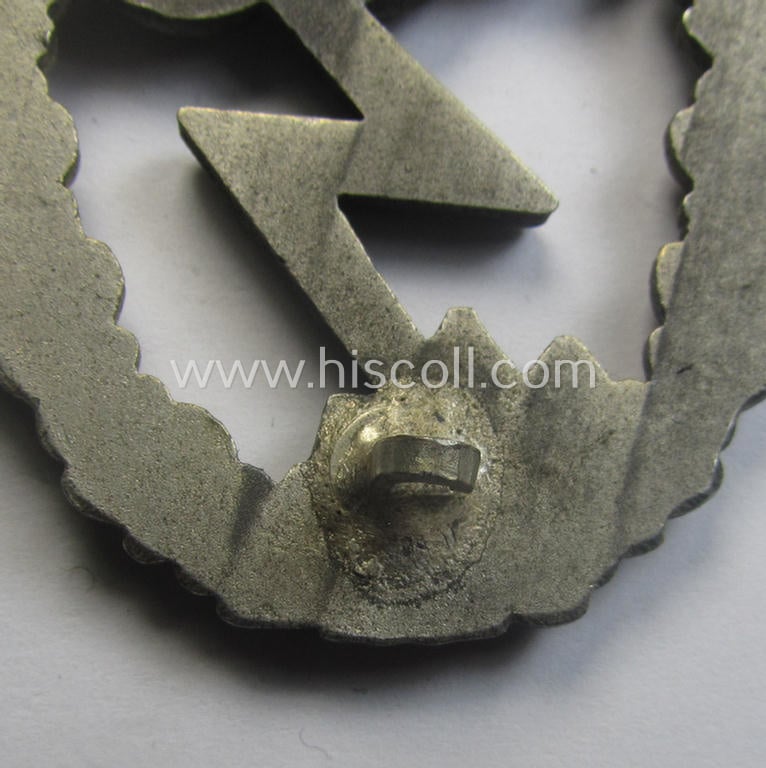 Mid- (ie. later-) war-period, zinc- (ie.'Feinzink'-) based version of a WH (Luftwaffe) 'Erdkampfabzeichen' (being a maker-marked example by the 'G.H. Osang'-company having a silvered- and 'riveted' eagle-device attached)