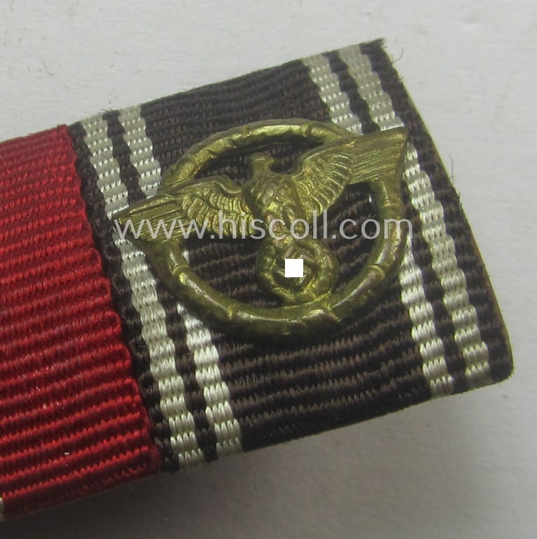 Three-pieced, WWII- ie.: TR-period ribbon-bar (ie. 'Feld- o. Bandspange') showing resp. an: 'EKII. Kl.', an: 'Ost'-medal and an: 'N.S.D.A.P. DA in Bronze' (ie. '3. Stufe für 10 Jahre t. Dienste')
