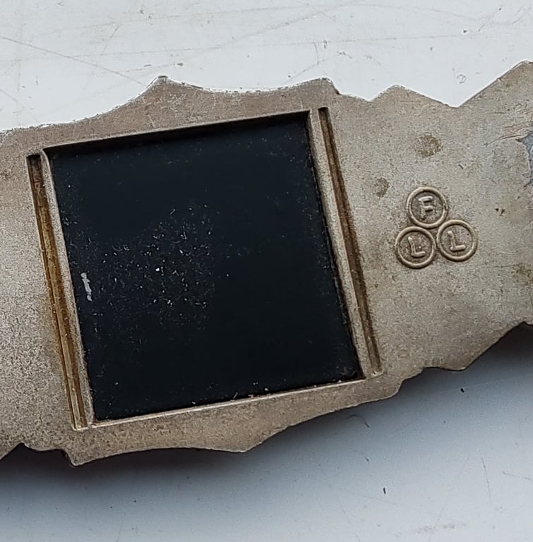 A  Nahkampfspange (Close Combat Clasp) in Silver Grade, manufactured by Friedrich Linden (FLL)