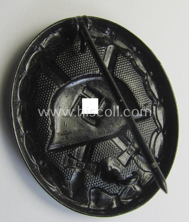 Superb - and neatly maker- (ie. '4'-) marked! - example of a black-class wound-badge (or: 'Verwundeten-Abzeichen in Schwarz') being an example that was produced by the maker (ie. 'Hersteller') named: 'Steinhauer & Lück'