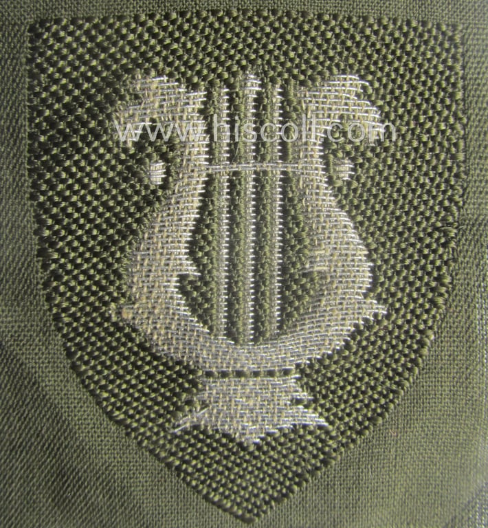 Rarely seen, RAD (ie. 'Reichsarbeitsdient') officers'-pattern armbadge as executed in neat 'BeVo'-weave 'flat-wire' pattern as was intended for usage by a: 'Muzikzug-Führer' (ie. 'RAD-Obermuzikzug-Führer')