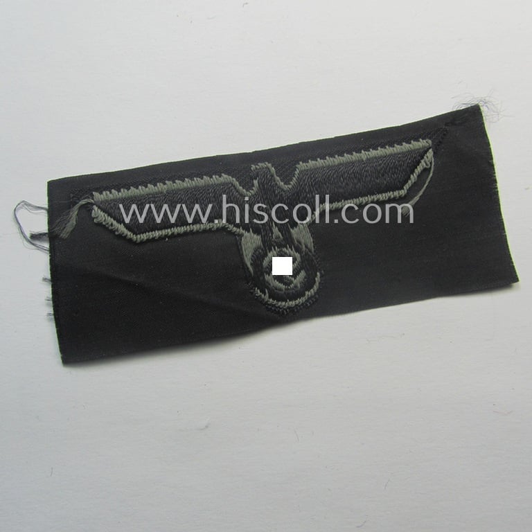 WH (Heeres) later- (ie. mid-war-) period- and/or bluish-grey-coloured 'Panzer'-type side-cap-eagle a executed in the neat 'BeVo'-weave pattern onto a typical black-coloured background