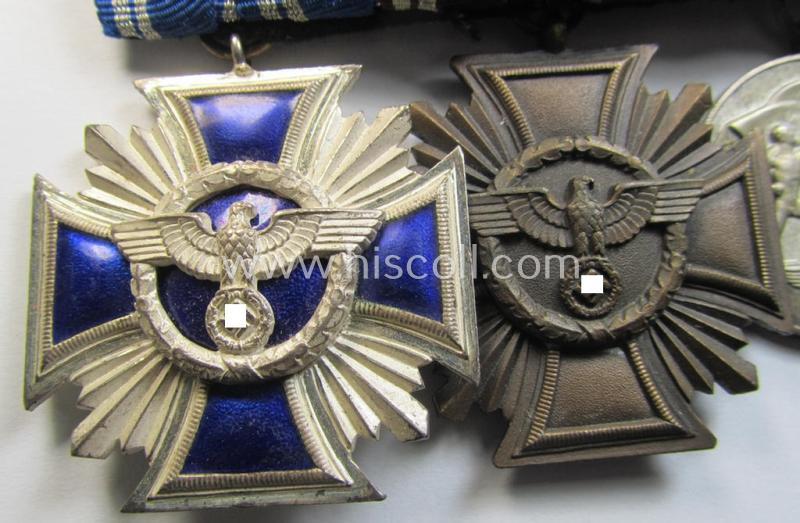 Superb, 3-pieced N.S.D.A.P.-related medal-bar (ie. 'Ordenspange') showing a: 'D.A. in Silber' (ie. '2. Stf. für 15 Jahre t.D.'), a: 'D.A. in Bronze' (ie. '3. Stf. für 10 Jahre t.D.') and an: Austrian 'Anschluss'-medal