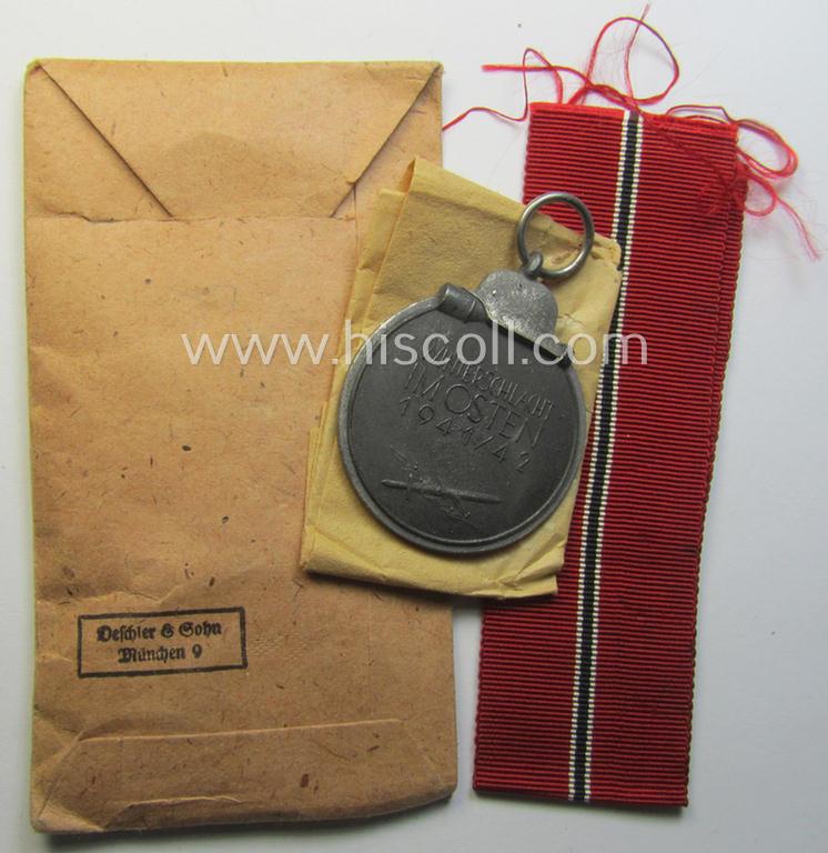 Superb medal-set: 'Winterschlacht im Osten 1941/42' as produced by the: 'Deschler u. Sohn'-company (being a non-maker-marked specimen that came stored in its original 'Zellstoff'-based pouch of issue as found)