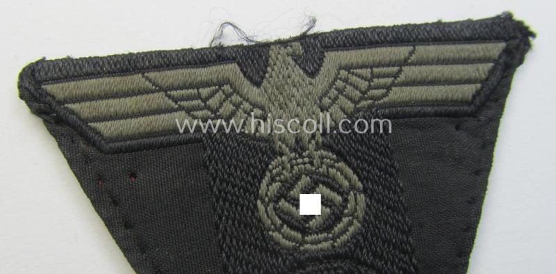 WH (Heeres) 'Panzer'-related, 'T-shaped'  ie. 'M42'-pattern cap-eagle/cocarde as executed in 'BeVo'-weave pattern (being a minimally stained example that comes in a clearly used- ie. once cap-attached, condition)