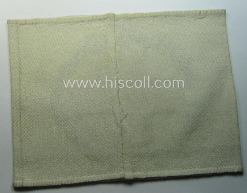 Linnen-based- and/or neatly 'machine-embroidered', beige-white-coloured DRK- (ie. 'Deutsches Rotes Kreuz'-) armband (ie. 'Armbinde') as was intended for the staff-members serving with the: 'Deutsches Rotes Kreuz' (or: German Red Cross)