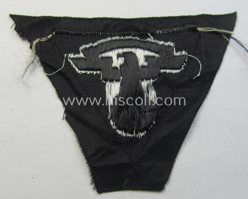 Attractive, so-called: N.S.K.K. (ie. 'National Socialistisches Kraftfahr Korps') side-cap-eagle (ie. 'Adler für Schiffchen o. Lagermütze') being a 'flat-wire-woven'-example that comes mounted onto a black-coloured background