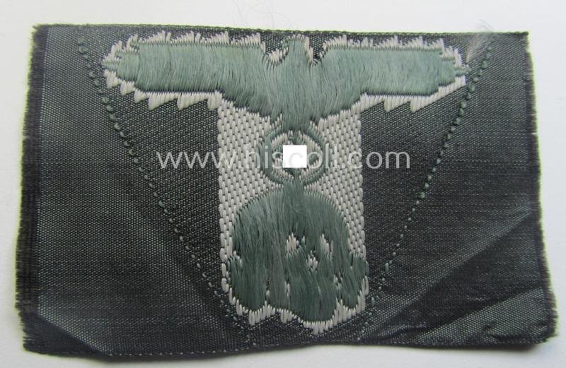 Superb - and simply never used nor cap-attached - Waffen-SS field-grey-coloured, M43-pattern cap-trapezoid as was intended for usage on the M43-model field-caps (ie. 'Einheitsfeldmützen') that comes in a 'virtually mint- ie. unissued', condition