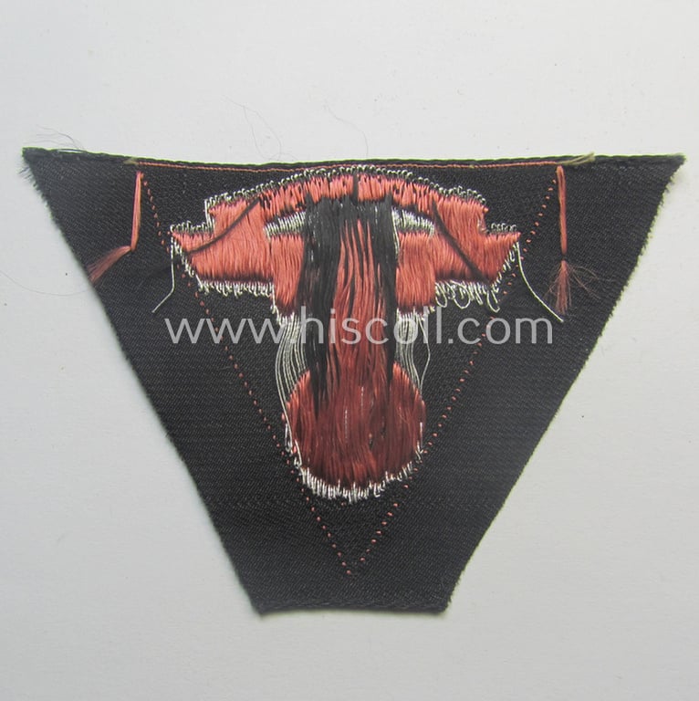 Never used - ie. 'virtually mint'! - so-called: N.S.K.K. (ie. 'National Soc. Kraftfahr Korps') side-cap-eagle (ie. 'Adler für Schiffchenmütze') being a 'BeVo'-woven example that comes mounted onto a darker-pink-coloured background