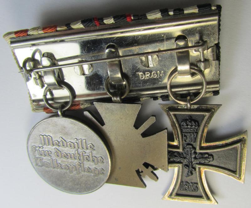 Attractive, WWI- (ie. TR-) period so-called: 'Ordenspange' (being of the desirable 'detachable'-pattern!) showing resp. an: 'EK II. Kl.'. a: 'FKK 1914-18 mit Schw.' and a: 'Deutsche Volkspflege'- (ie. civil-service-) medal