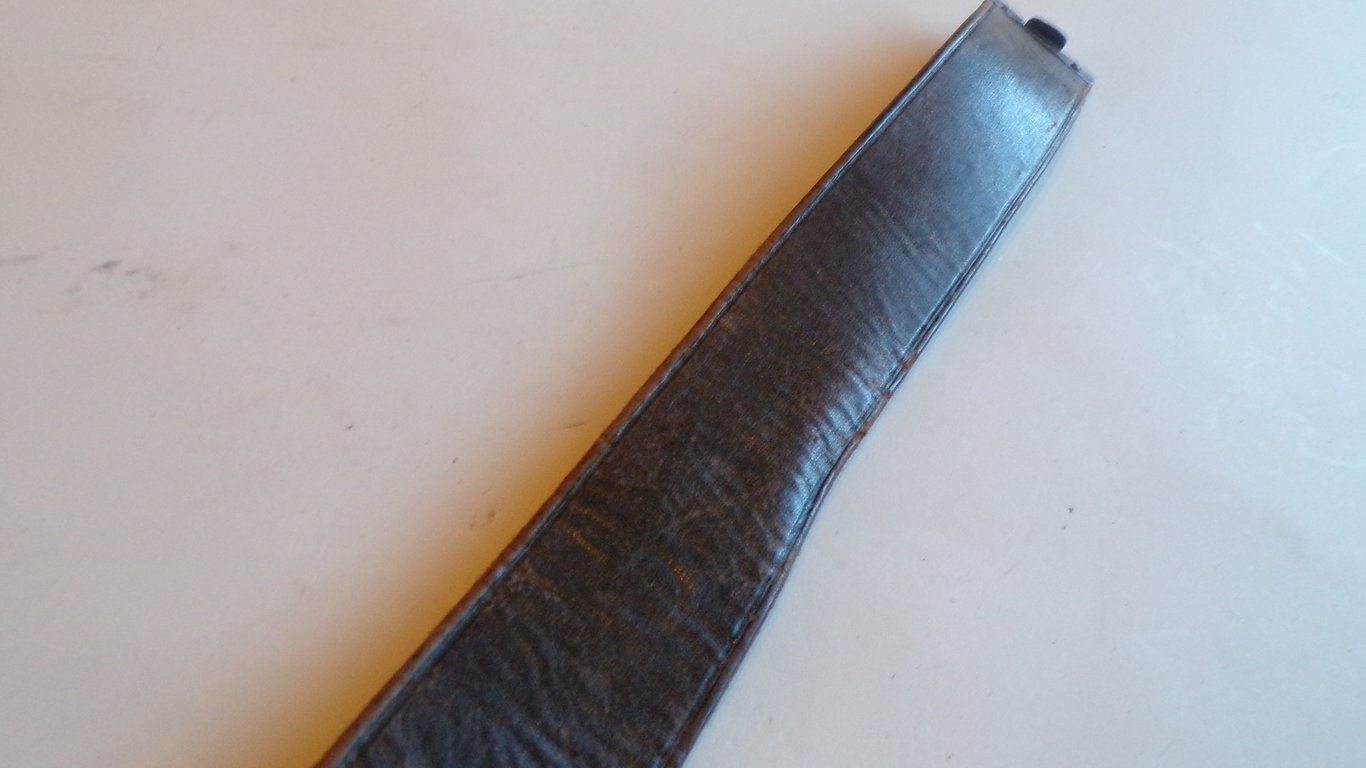 S.A brown leather belt and buckle